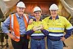 From left: Independence Group CEO Peter Bradford, Tropicana General Manager Duncan Gibbs and AngloGold Ashanti SVP Australia Mike Erickson with the milestone bar. Photo taken by Aaron Bunch.